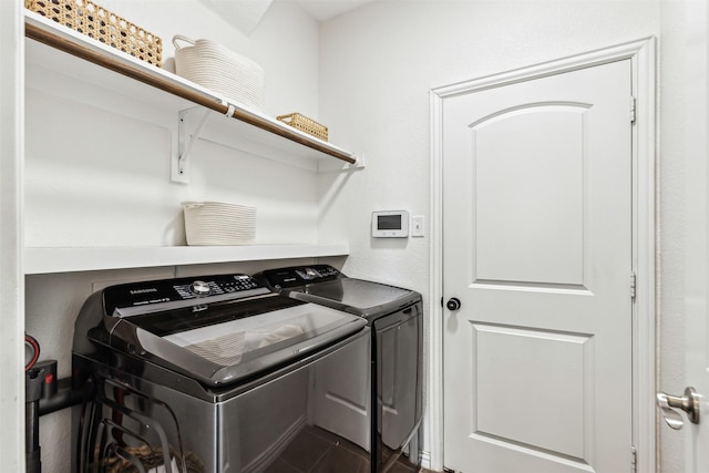 laundry room with washing machine and dryer and laundry area