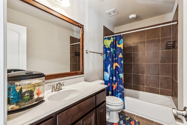 full bath featuring tile patterned flooring, toilet, vanity, visible vents, and shower / bath combination with curtain