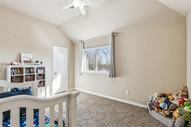 carpeted bedroom featuring vaulted ceiling, a ceiling fan, and baseboards