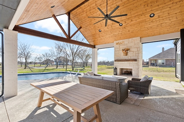 view of patio with an outdoor pool, an outdoor living space with a fireplace, and fence