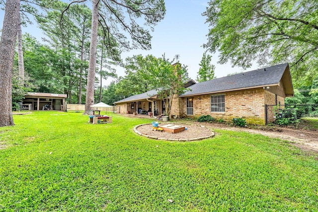 view of yard featuring fence