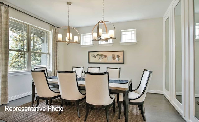 dining area with wood finished floors and baseboards