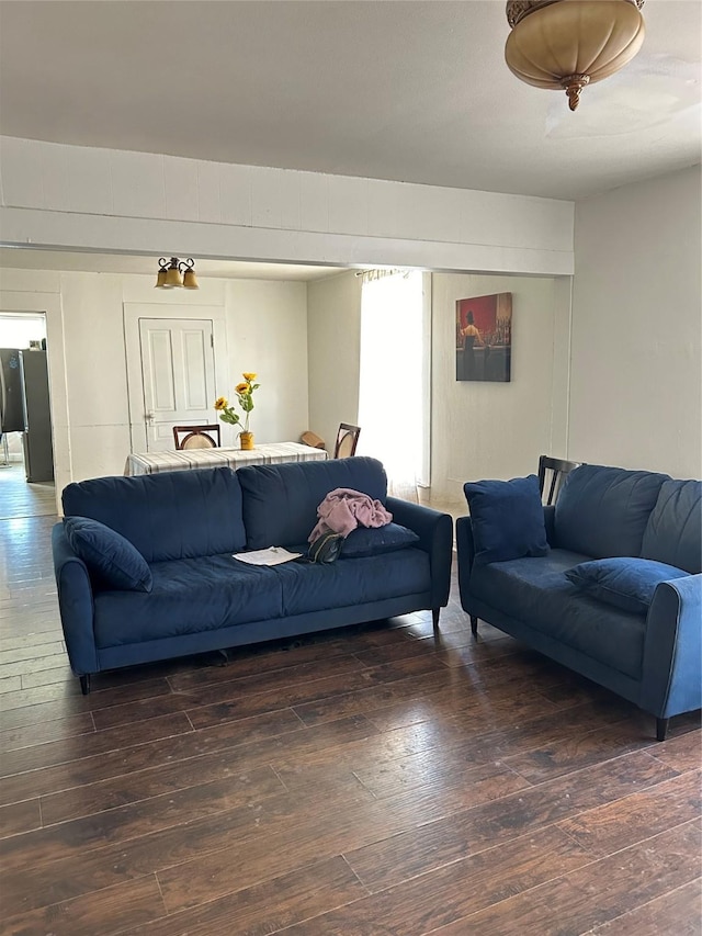 living room with dark wood-type flooring