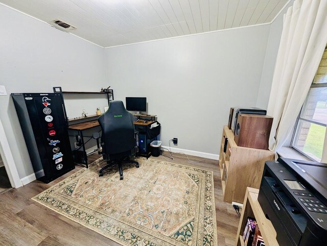 873 Beverly Dr, Terrell, TX 75160 - office area featuring wood finished floors, baseboards, and crown molding