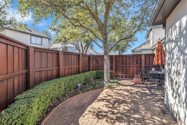 view of patio featuring a fenced backyard