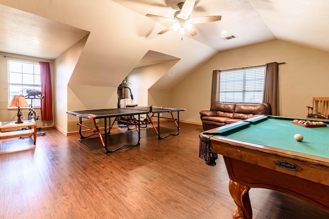 game room with a healthy amount of sunlight, visible vents, and wood finished floors