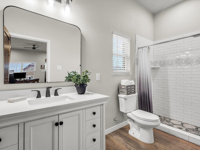 1300 Ruby Lea Ln, Fort Worth, TX 76179 - full bathroom with ceiling fan, vanity, a tile shower, and wood finished floors