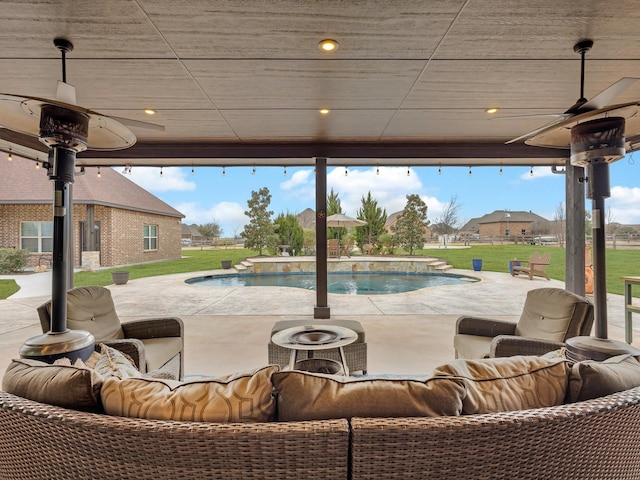 view of patio / terrace featuring an outdoor pool, an outdoor living space, and ceiling fan