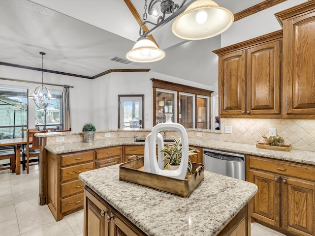1300 Ruby Lea Ln, Fort Worth, TX 76179 - kitchen featuring dishwasher, a chandelier, a center island, decorative backsplash, and brown cabinetry