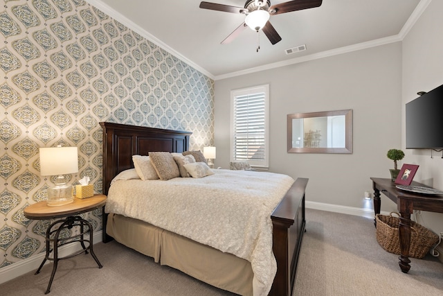 bedroom featuring light colored carpet, crown molding, visible vents, baseboards, and wallpapered walls