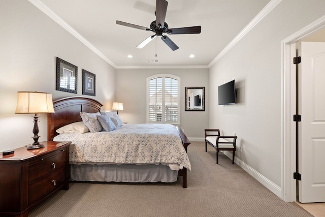 bedroom featuring baseboards, visible vents, ornamental molding, and light colored carpet