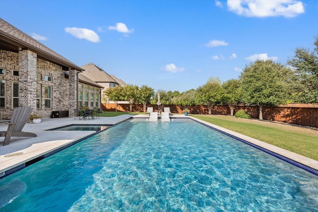 view of pool with a fenced in pool, a patio area, a fenced backyard, and a yard