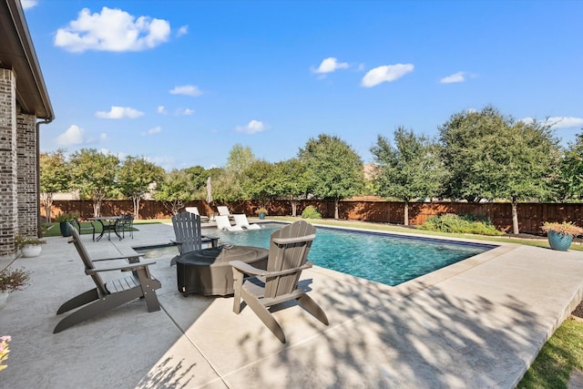 view of pool featuring a fenced in pool, a fenced backyard, a patio, and a jacuzzi