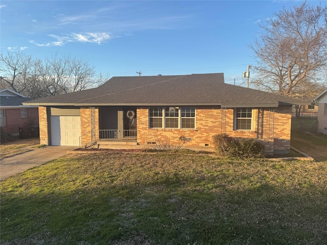 ranch-style house with a garage, brick siding, driveway, crawl space, and a front lawn