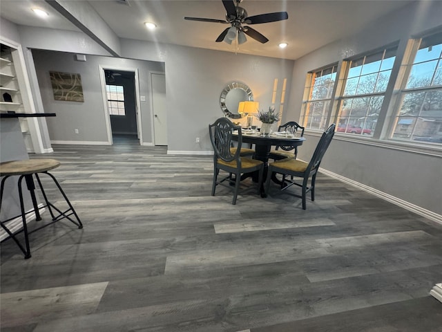 dining area with a healthy amount of sunlight, dark wood-type flooring, recessed lighting, and baseboards