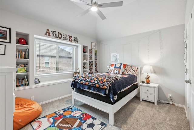 bedroom featuring a ceiling fan, light carpet, vaulted ceiling, and baseboards