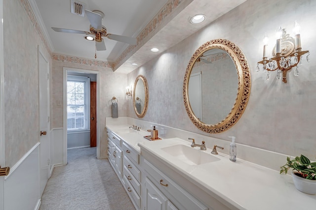 bathroom featuring double vanity, wallpapered walls, visible vents, and a sink