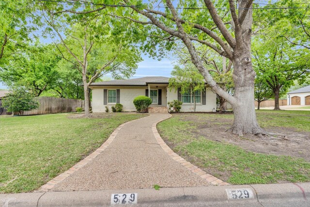 529 N Grand Ave, Waxahachie, TX 75165 - ranch-style home with brick siding