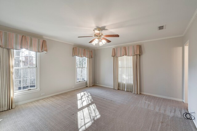 529 N Grand Ave, Waxahachie, TX 75165 - empty room featuring ornamental molding, a ceiling fan, light carpet, and baseboards