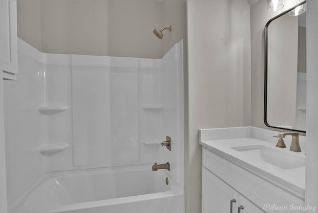 bathroom with bathtub / shower combination and vanity