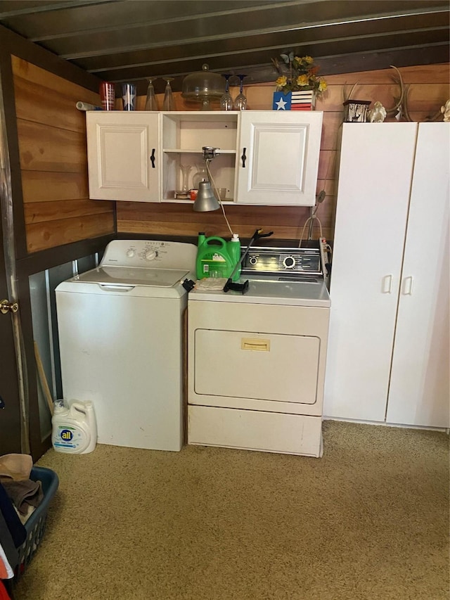 laundry room with cabinet space and washing machine and clothes dryer