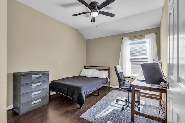 bedroom featuring lofted ceiling, ceiling fan, baseboards, and wood finished floors