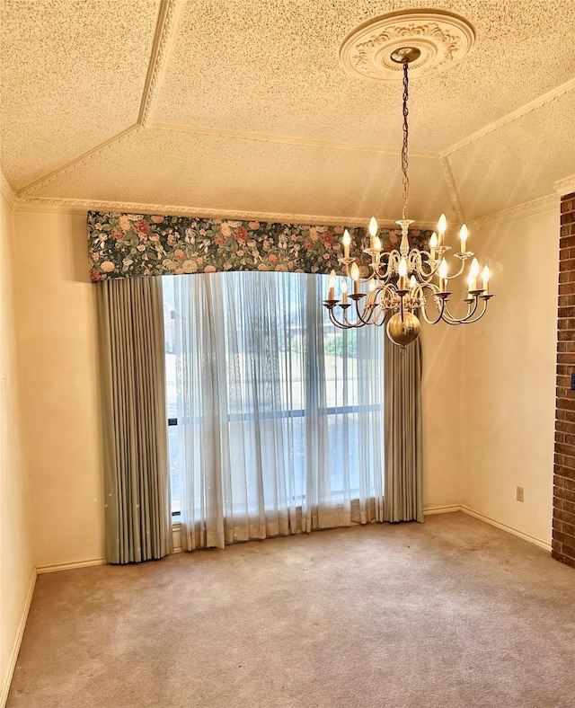 empty room with carpet flooring, vaulted ceiling, and a textured ceiling