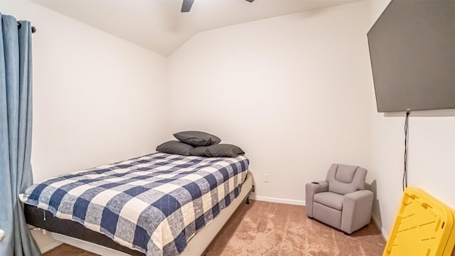 bedroom featuring vaulted ceiling, carpet, a ceiling fan, and baseboards