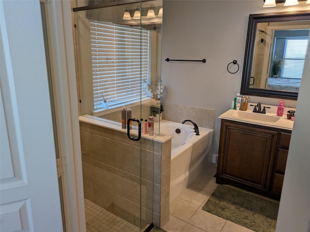 4248 Old Timber Ln, Fort Worth, TX 76036 - ensuite bathroom featuring ensuite bathroom, a garden tub, tile patterned flooring, vanity, and a shower stall
