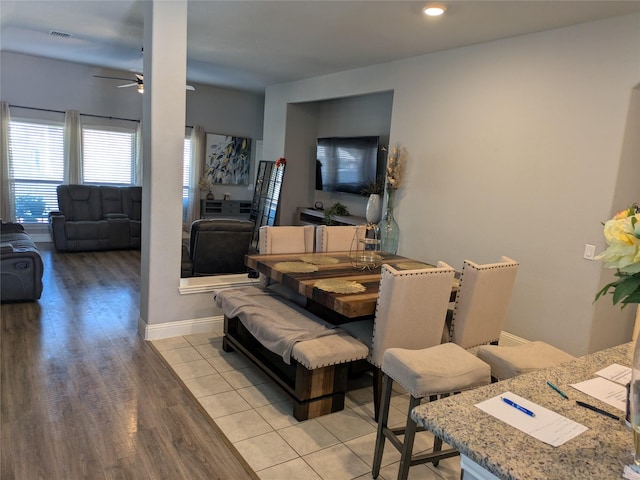 4248 Old Timber Ln, Fort Worth, TX 76036 - dining space with visible vents, light wood-type flooring, a ceiling fan, and baseboards