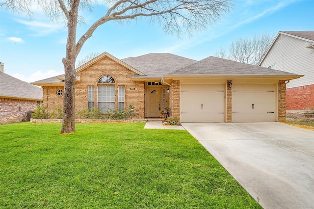 ranch-style home with a garage, brick siding, concrete driveway, roof with shingles, and a front yard