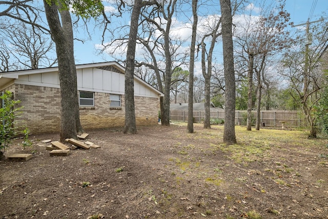 view of yard featuring fence