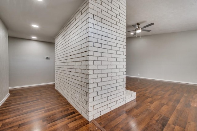 spare room featuring dark wood-type flooring, recessed lighting, a ceiling fan, and baseboards