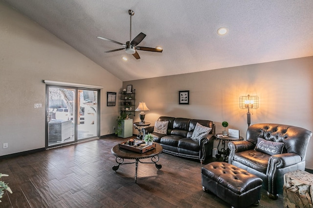 living room featuring a textured ceiling, dark wood-type flooring, a ceiling fan, and baseboards