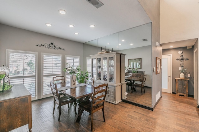 dining area with visible vents, baseboards, light wood-style flooring, and recessed lighting