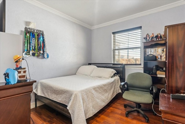 bedroom with dark wood-style floors and ornamental molding