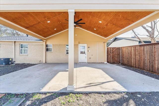 view of patio / terrace featuring ceiling fan, central AC unit, and fence