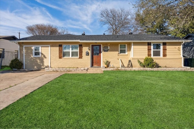 single story home with brick siding and a front yard