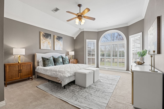 bedroom with lofted ceiling, light carpet, a ceiling fan, visible vents, and crown molding