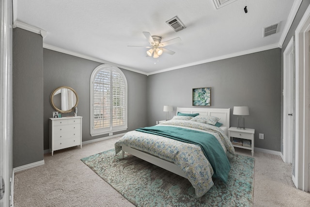 bedroom featuring crown molding, visible vents, and baseboards