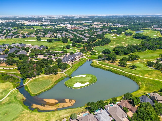 bird's eye view with golf course view and a water view