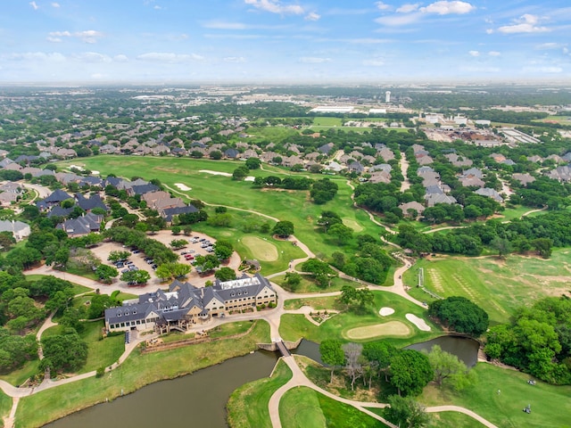 aerial view featuring a water view and golf course view