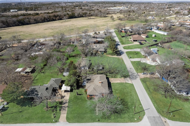 birds eye view of property with a residential view