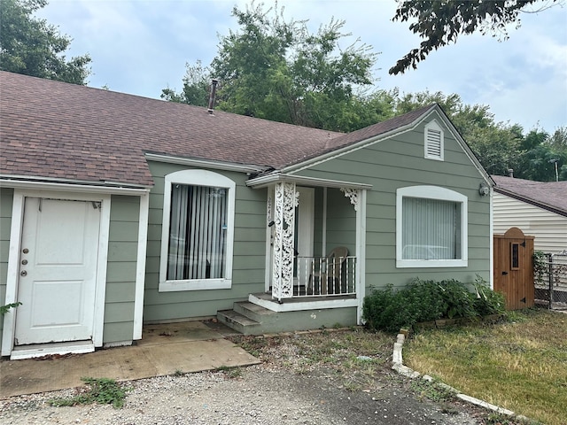 view of front of home featuring a shingled roof