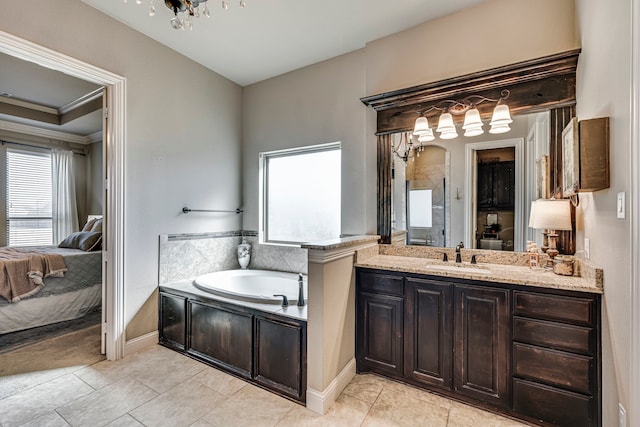 full bath with a healthy amount of sunlight, connected bathroom, vanity, and a garden tub