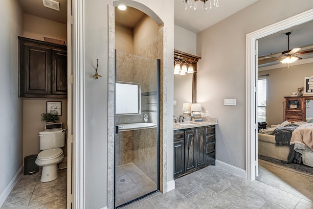 bathroom with a shower stall, visible vents, ceiling fan, and vanity