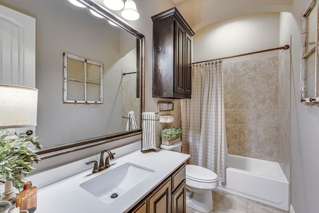 full bathroom with shower / bath combination with curtain, tile patterned flooring, vanity, and toilet