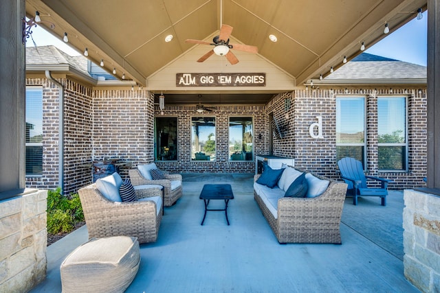 view of patio with an outdoor living space and a ceiling fan