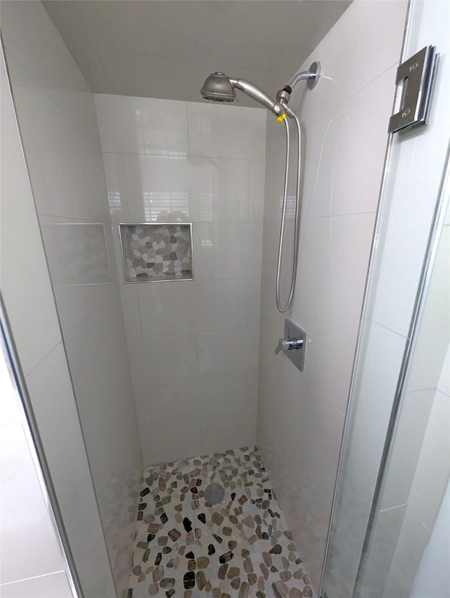 bathroom featuring a stall shower