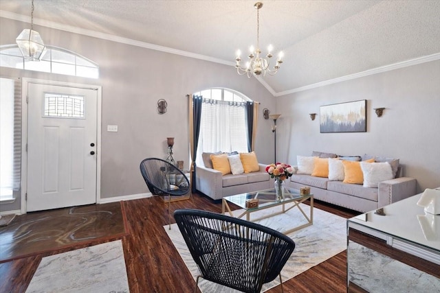 living area with a healthy amount of sunlight, an inviting chandelier, vaulted ceiling, and dark wood finished floors